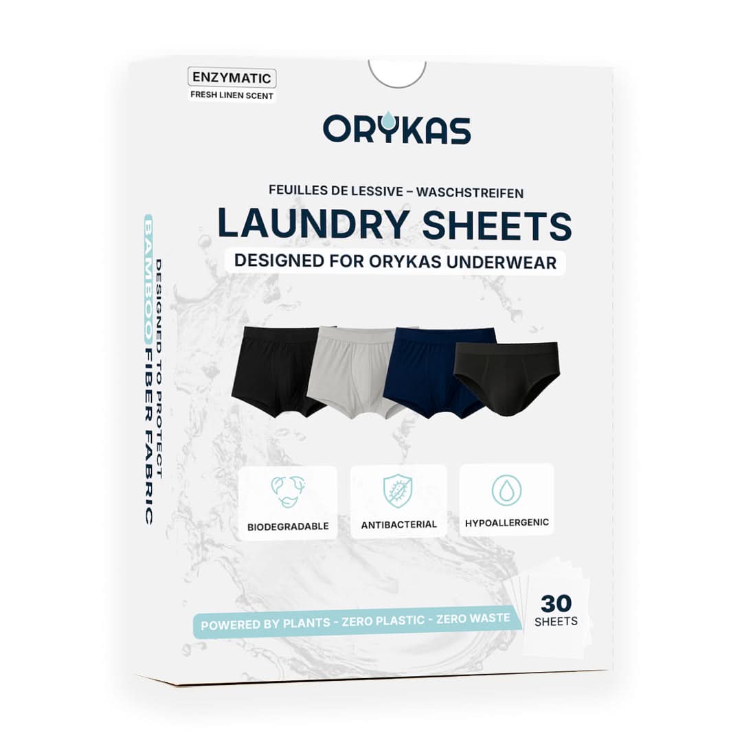 Box of Orykas laundry sheets, biodegradable, antibacterial, and hypoallergenic, designed to protect bamboo fiber boxers and briefs.