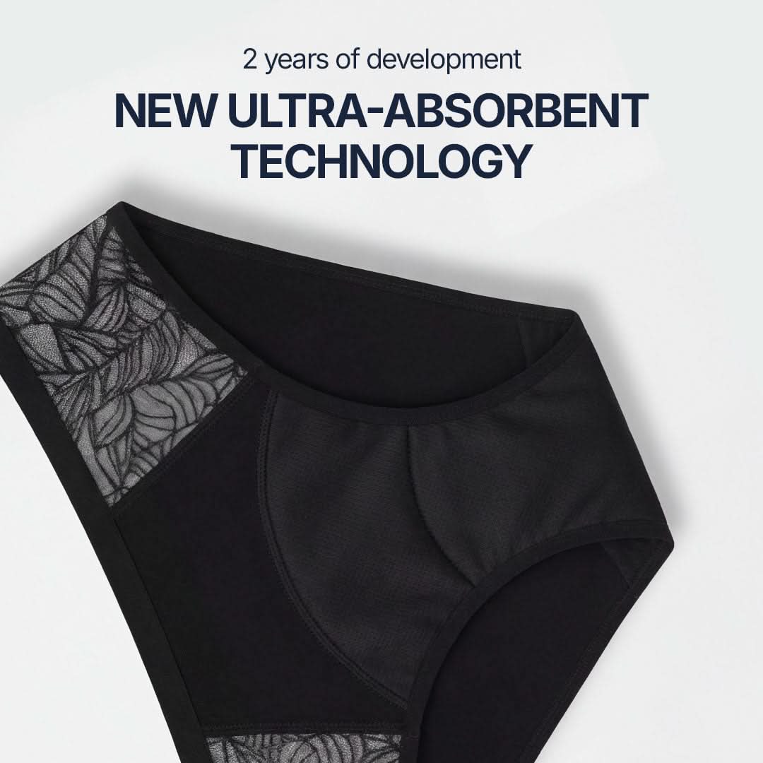 Black absorbent underwear for female incontinence with elegant side lace and ultra-absorbent technology developed over 2 years, discreet and washable protection for light to moderate bladder leaks, designed for breathable comfort and everyday confidence.