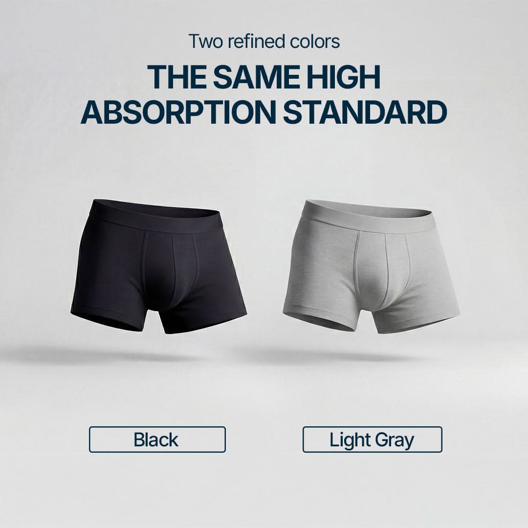 Two absorbent boxer briefs for light bladder leaks in black and light gray, offering the same high level of absorption and comfort, washable and discreet underwear for mild male incontinence, available in two elegant color options.