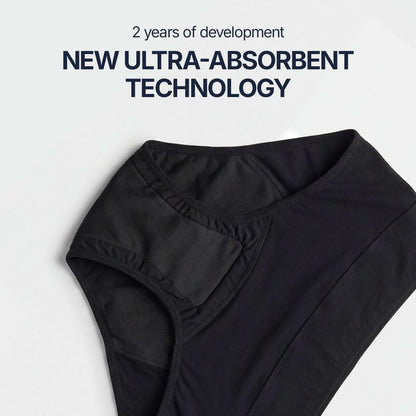 Close-up detail of black absorbent underwear for female incontinence, featuring new ultra-absorbent technology developed over 2 years, enhanced multi-layer protection designed for light to moderate bladder leaks.