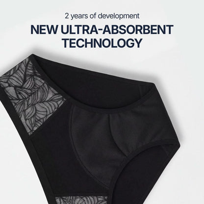 Black absorbent underwear for female incontinence with elegant side lace and ultra-absorbent technology developed over 2 years, discreet and washable protection for light to moderate bladder leaks, designed for breathable comfort and everyday confidence.