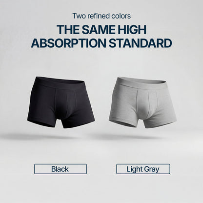 Two absorbent boxer briefs for light bladder leaks in black and light gray, offering the same high level of absorption and comfort, washable and discreet underwear for mild male incontinence, available in two elegant color options.