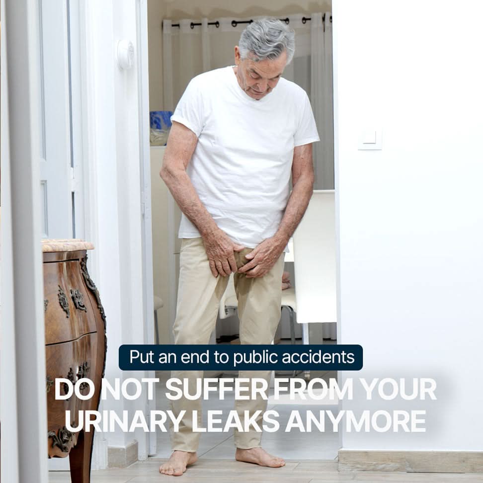 Senior man standing in a doorway, holding his pants at the crotch after a bladder leak accident, visual illustrating the embarrassment of public accidents with the message “No more public accidents” and “Stop letting bladder leaks control you,” highlighting the need for a discreet and protective solution.